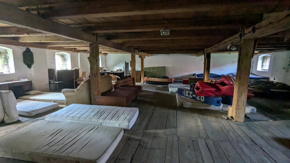 The interior of the venue barn used as a shared festival space.