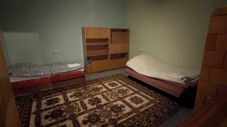 Reference photo of Opposite Right upstairs Room 1, listed with two single beds.
